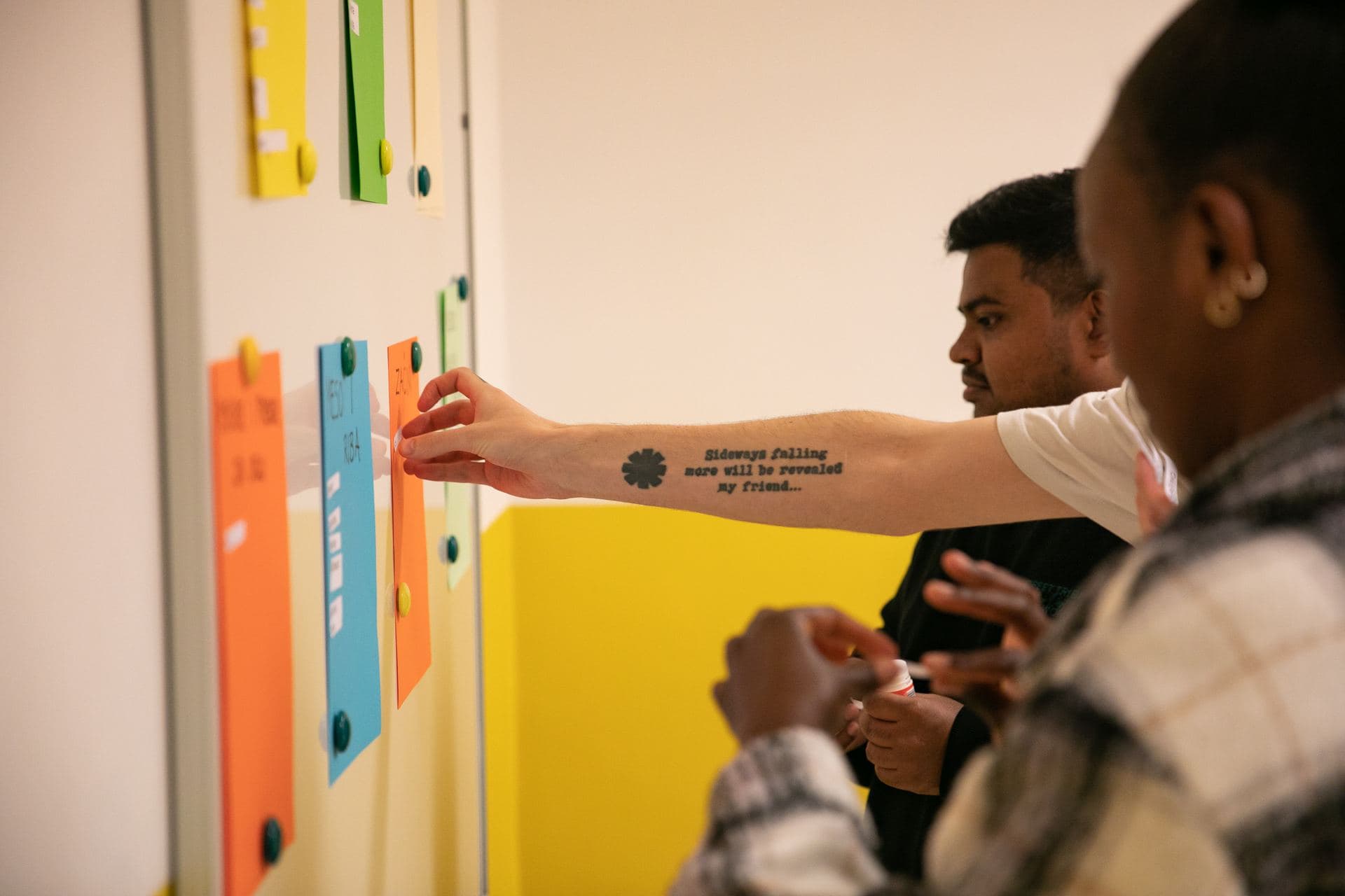 Participants sorting ideas on sticky notes